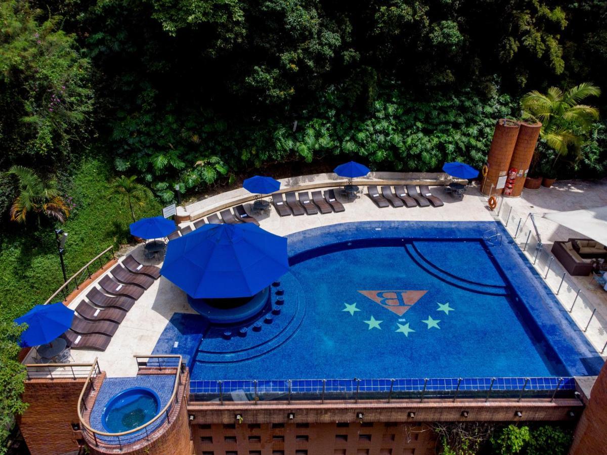 Hotel Dann Carlton Belfort Меделин Екстериор снимка The swimming pool at the hotel