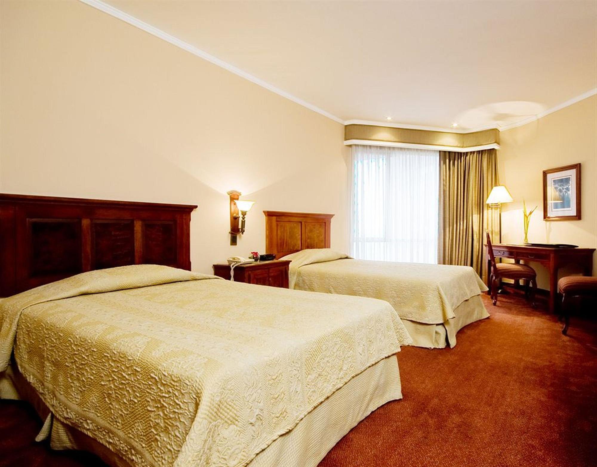 Hotel Dann Carlton Belfort Меделин Екстериор снимка A room at the hotel